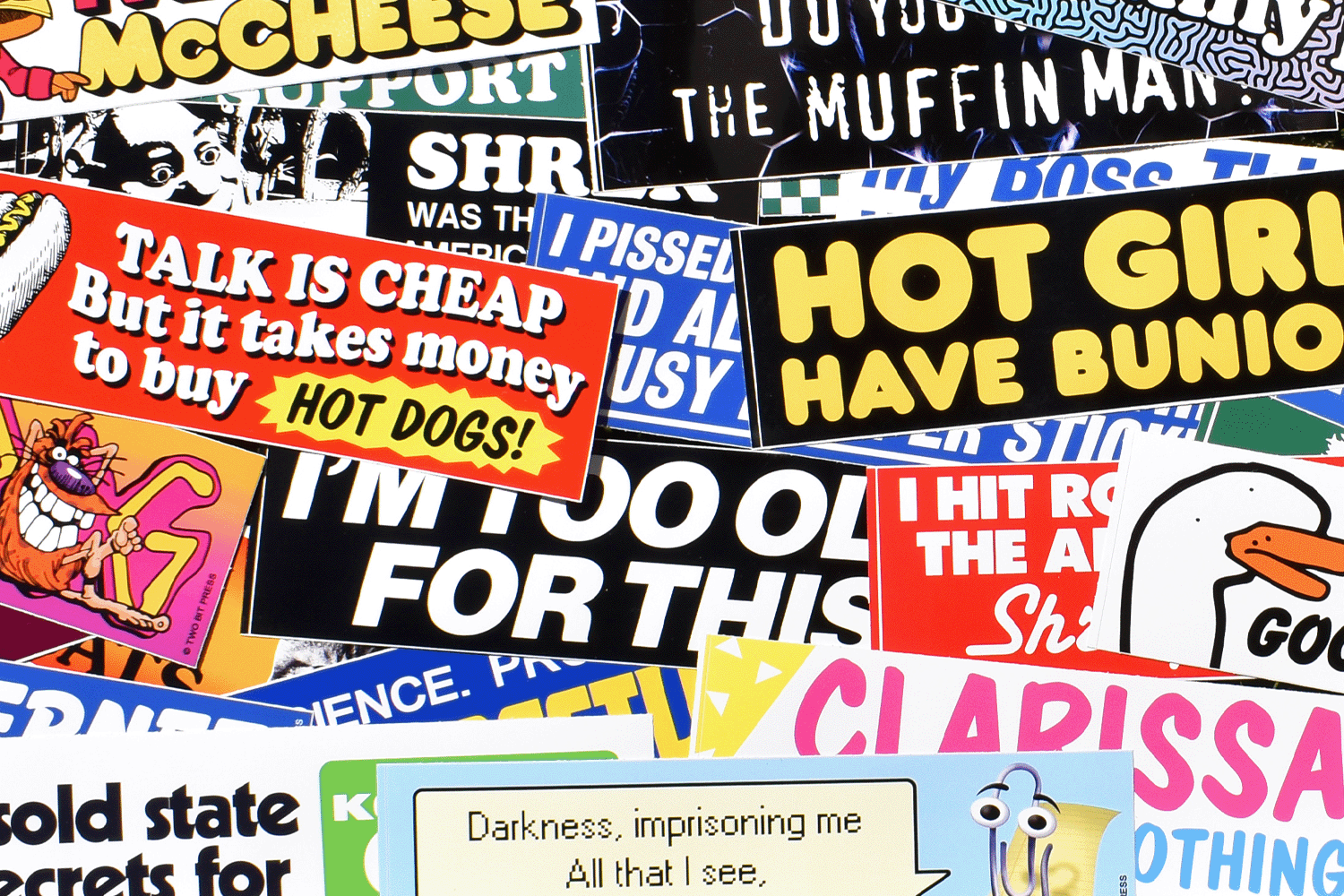 Collection of various Two Bit Press bumper stickers with different designs and text.