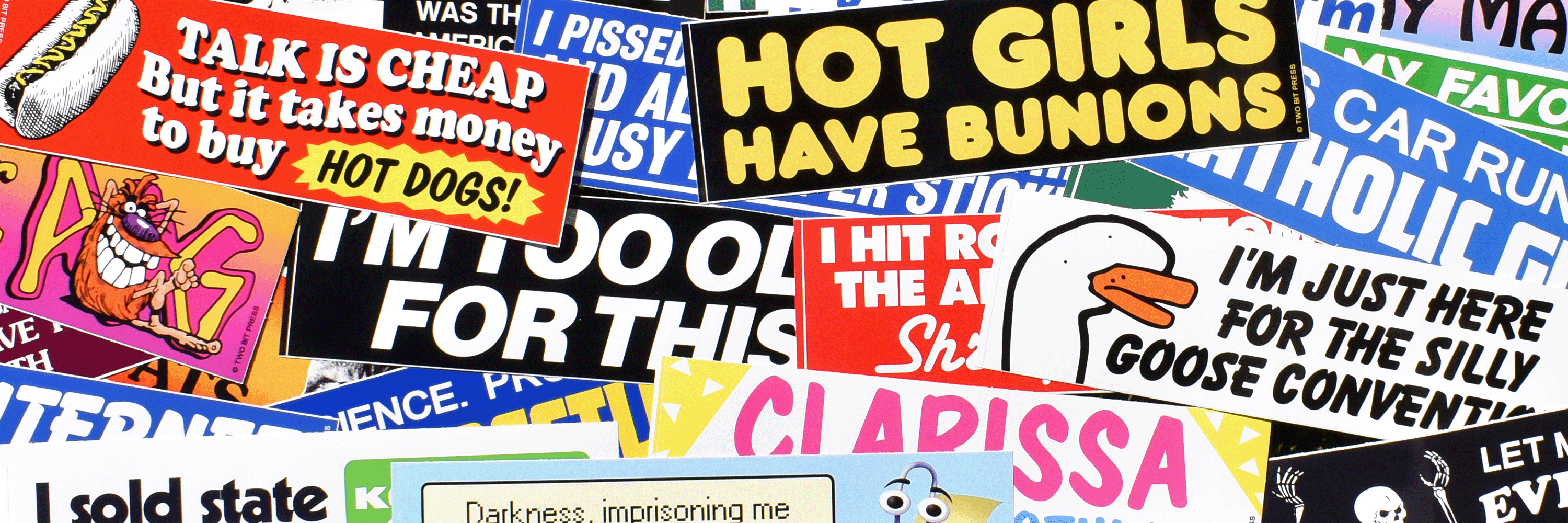 Collection of various Two Bit Press bumper stickers with different designs and text.