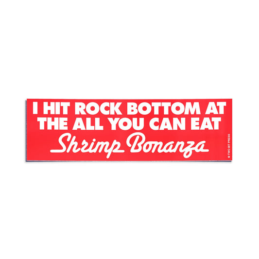 A vinyl bumper sticker reading "I HIT ROCK BOTTOM AT THE ALL YOU CAN EAT Shrimp Bonanza" on a white background.