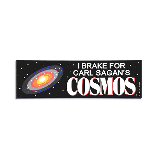 A vinyl bumper sticker showing a galaxy graphic and the text "I BRAKE FOR CARL SAGAN'S COSMOS" on a white background.