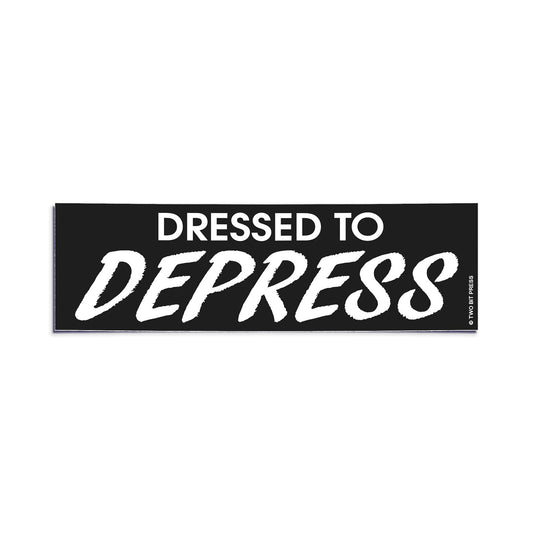 A vinyl bumper sticker reading "DRESSED TO DEPRESS" on a white background.