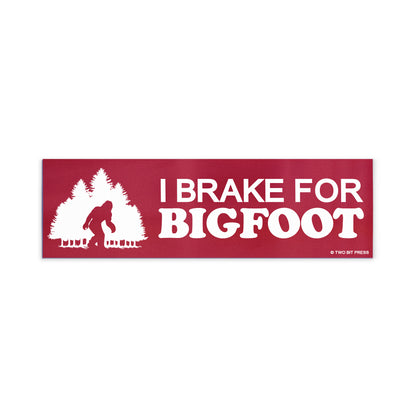 A vinyl bumper magnet showing a sasquatch and the text "I BRAKE FOR BIGFOOT" on a white background.