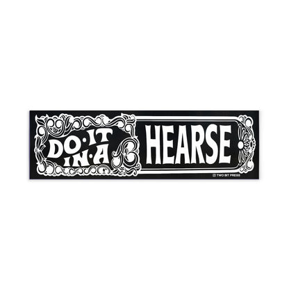 A vinyl bumper magnet reading "DO IT IN A HEARSE" on a white background.
