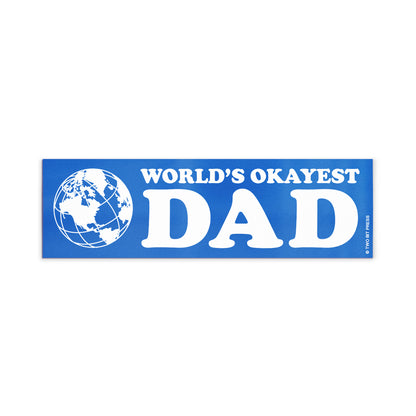 A vinyl bumper magnet showing a globe and the text "WORLD'S OKAYEST DAD" on a white background.