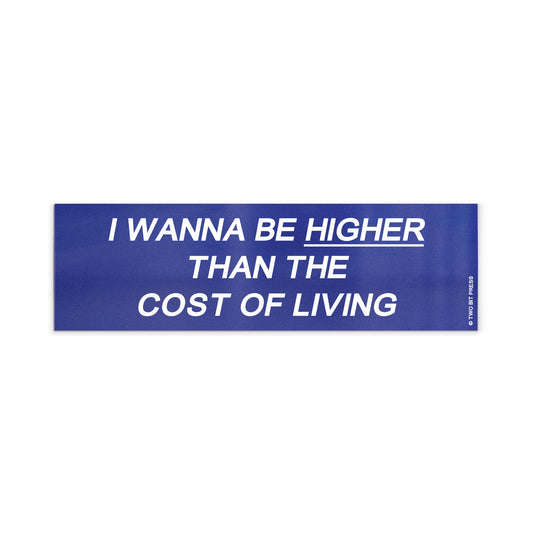 A vinyl bumper magnet reading "I WANNA BE HIGHER THAN THE COST OF LIVING" on a white background.