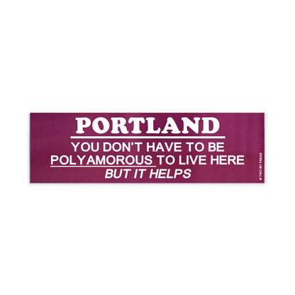 A vinyl bumper magnet reading "PORTLAND YOU DON'T HAVE TO BE POLYAMOROUSTO LIVE HERE BUT IT HELPS" on a white background.