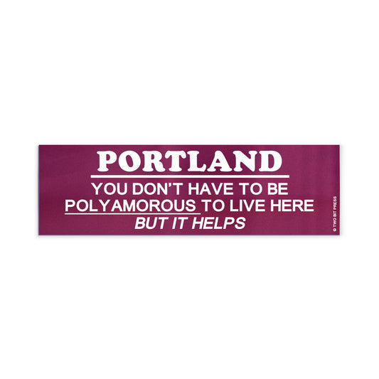 A vinyl bumper magnet reading "PORTLAND YOU DON'T HAVE TO BE POLYAMOROUSTO LIVE HERE BUT IT HELPS" on a white background.