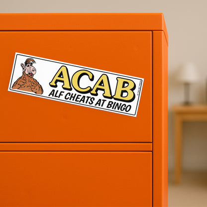 A vinyl bumper magnet showing Alf and the text "ACAB Alf Cheats at Bingo" on orange filing cabinet.