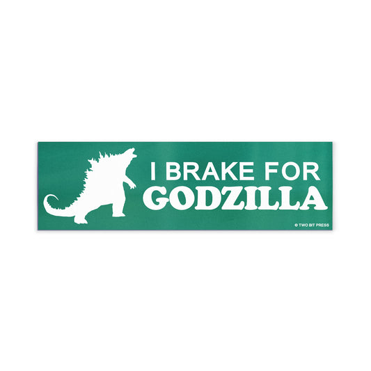 A vinyl bumper magnet showing Godzilla and the text "I BRAKE FOR GODZILLA" on a white background.