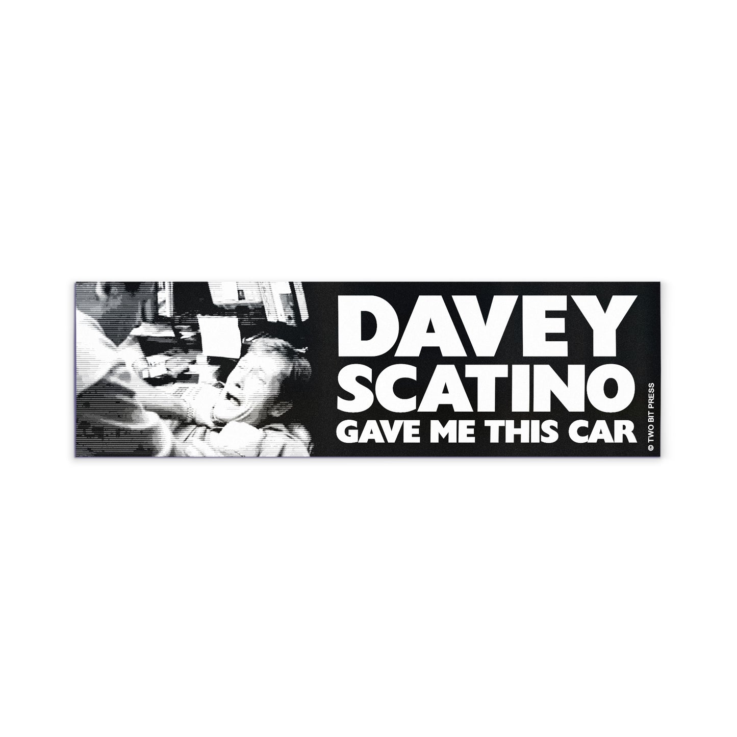 A vinyl bumper magnet showing the Sopranos and the text "DAVEY SCATINO GAVE ME THIS CAR" on a white background.