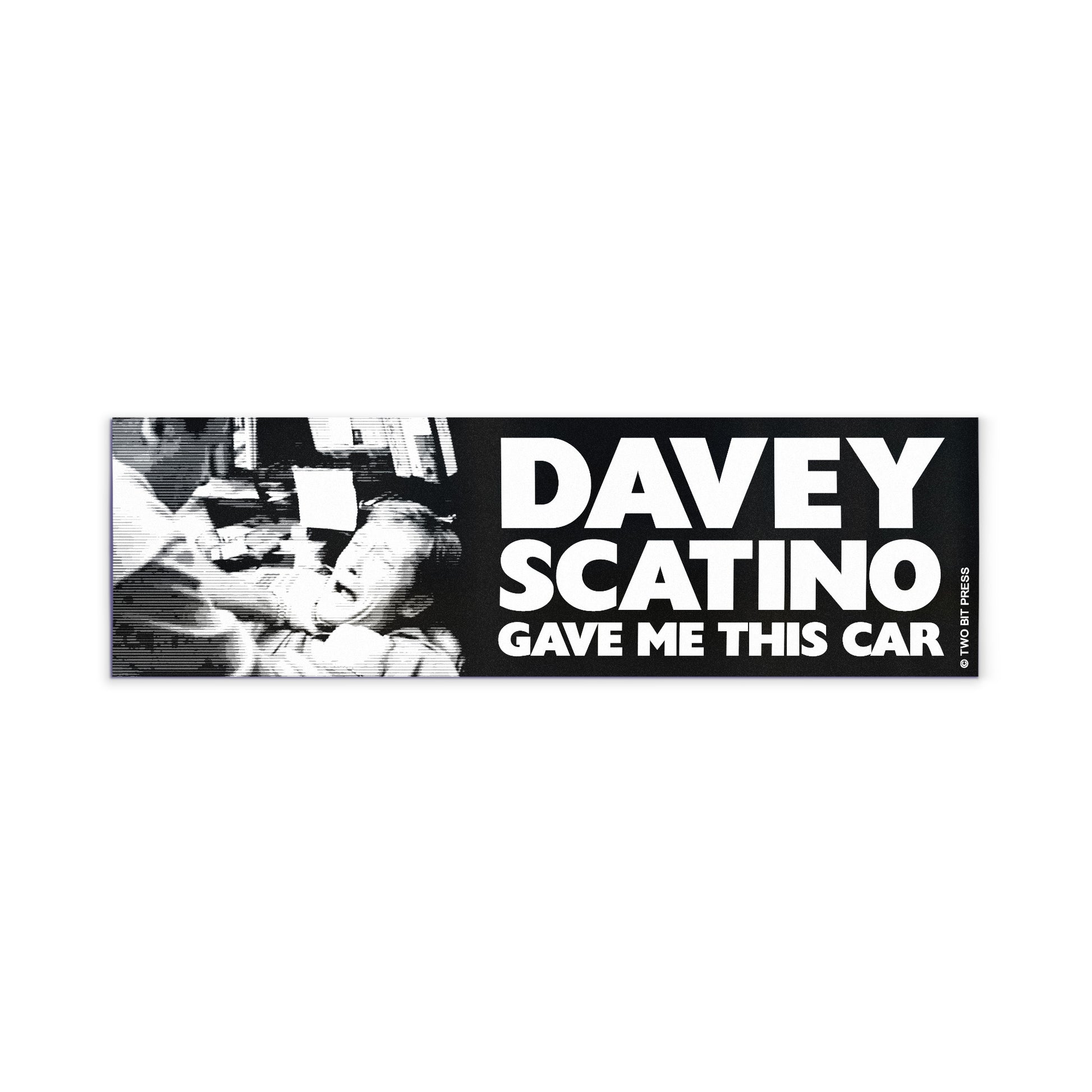A vinyl bumper magnet showing the Sopranos and the text "DAVEY SCATINO GAVE ME THIS CAR" on a white background.