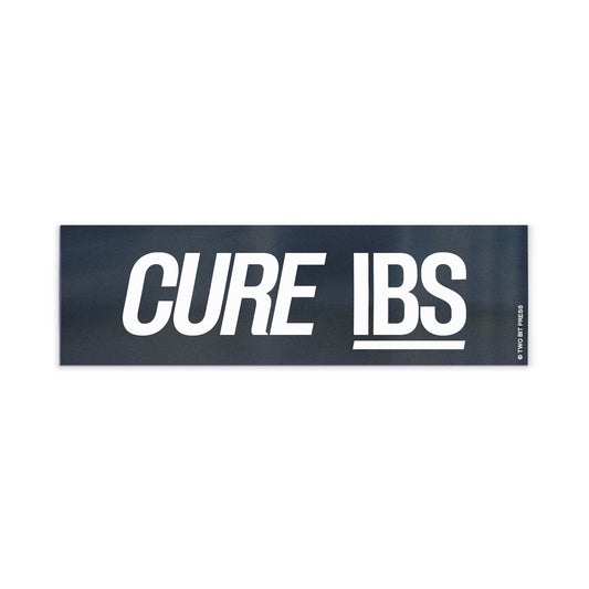 A vinyl bumper magnet reading "CURE IBS" on a white background.