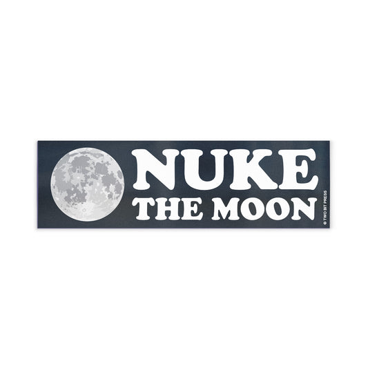 A vinyl bumper magnet showing the moon and the text "NUKE the MOON" on a white background.