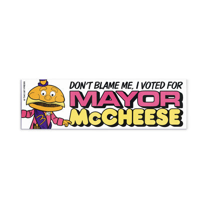 A vinyl bumper magnet showing Mayor McCheese and the text "DON‚àö√ØT BLAME ME I VOTED FOR MAYOR MCCHEESE" on a white background.