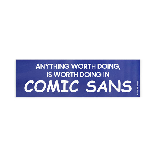 A vinyl bumper magnet reading "ANYTHING WORTH DOING IS WORTH DOING IN COMIC SANS" on a white background.