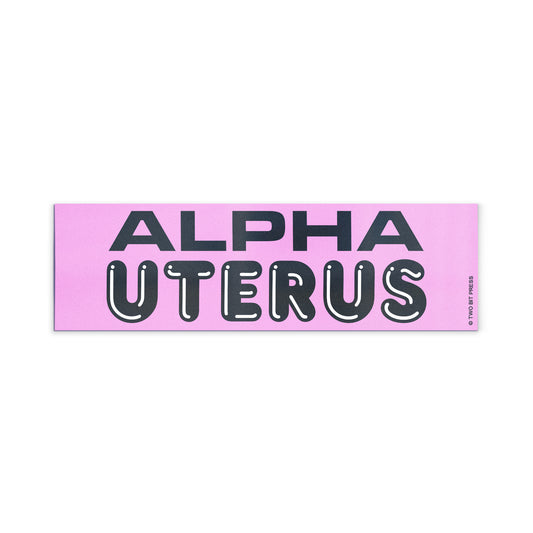 A vinyl bumper magnet reading "ALPHA UTERUS" on a white background.