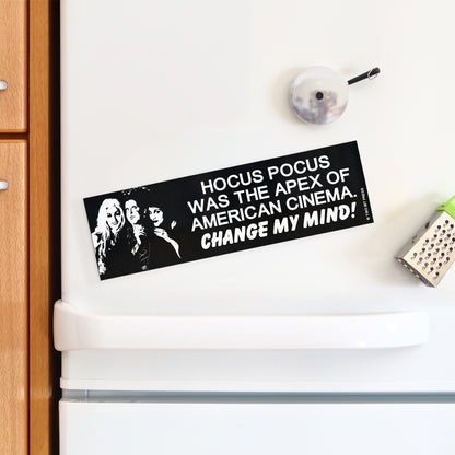 A vinyl bumper magnet reading "HOCUS POCUS WAS THE APEX OF AMERICAN CINEMA. CHANGE MY MIND!" on a white fridge.