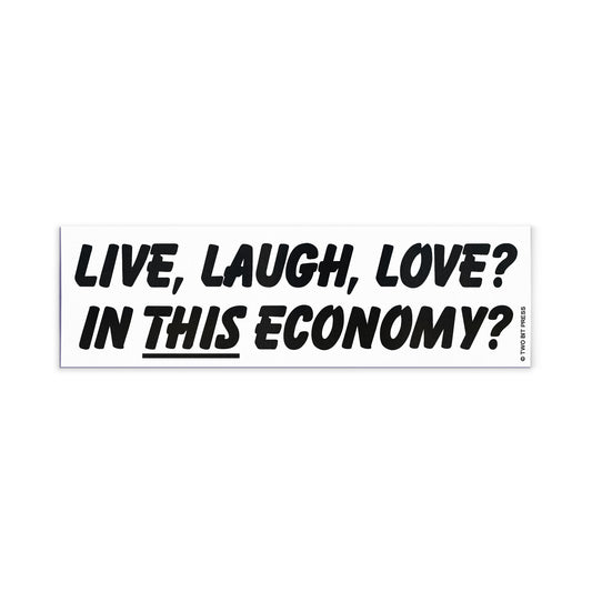 A vinyl bumper magnet reading "LIVE, LAUGH, LOVE? IN THIS ECONOMY?" on a white background.