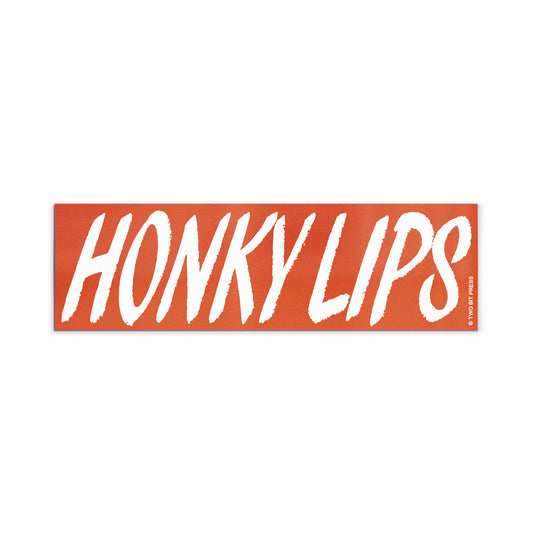 A vinyl bumper magnet reading "HONKY LIPS" on a white background.