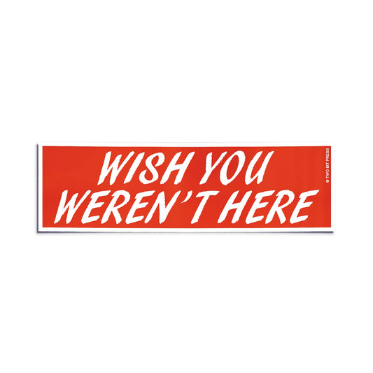 A vinyl bumper sticker reading "WISH YOU WEREN'T HERE" on a white background.